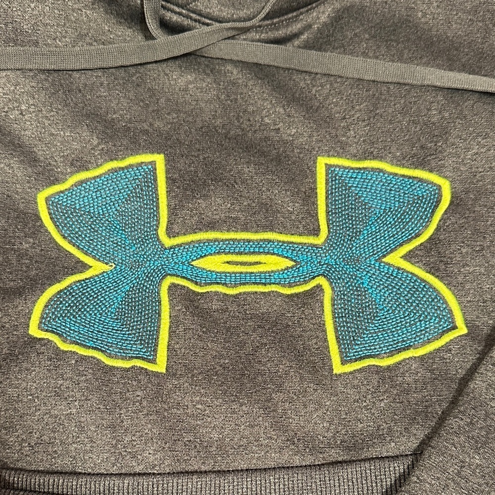 Under Armour Storm Semi Fitted Charcoal Gray Hoodie with Blue and Yellow logo. - Picture 2 of 7